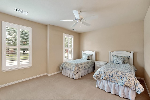 11908 Glenbrook St, Denton, TX 76207 - carpeted bedroom featuring baseboards and a ceiling fan