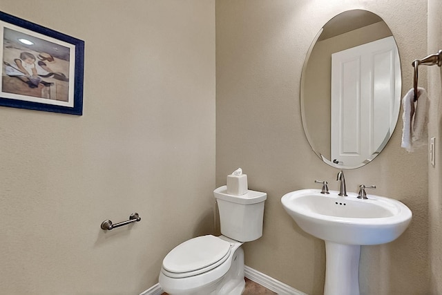 11908 Glenbrook St, Denton, TX 76207 - bathroom with toilet and baseboards