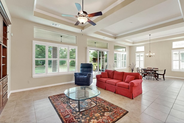 11908 Glenbrook St, Denton, TX 76207 - living room featuring a raised ceiling, light tile patterned floors, a ceiling fan, a chandelier, and crown molding