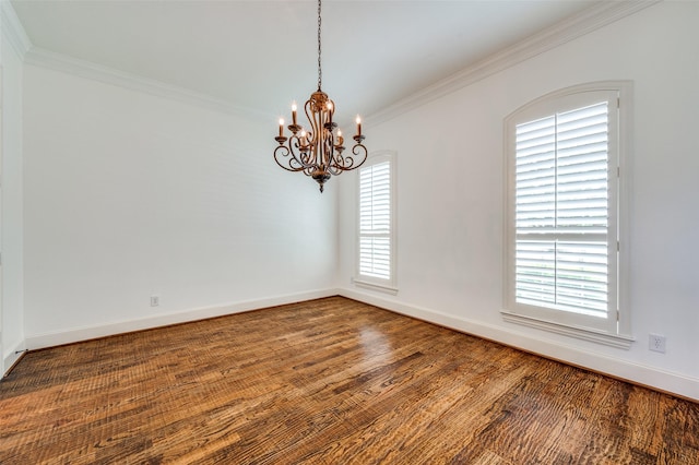 1210 Carlisle Ct, Frisco, TX 75036 - empty room with a chandelier, ornamental molding, baseboards, and wood finished floors