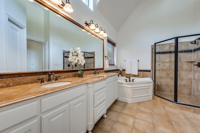 1210 Carlisle Ct, Frisco, TX 75036 - bathroom featuring lofted ceiling, a shower stall, a garden tub, double vanity, and tile patterned floors