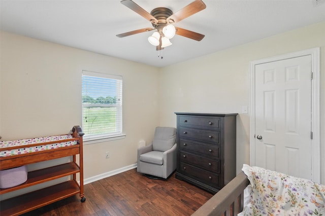205 Davis Rd, Combine, TX 75159 - bedroom with dark wood-style floors, baseboards, and a ceiling fan