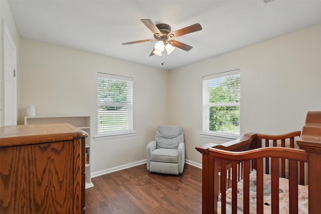 205 Davis Rd, Combine, TX 75159 - bedroom featuring multiple windows, wood finished floors, baseboards, and ceiling fan