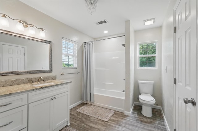 205 Davis Rd, Combine, TX 75159 - bathroom featuring wood finished floors, baseboards, and plenty of natural light