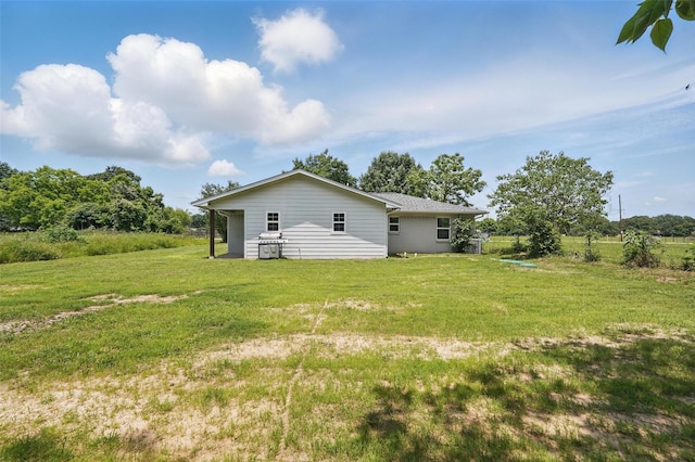 205 Davis Rd, Combine, TX 75159 - rear view of property featuring a yard