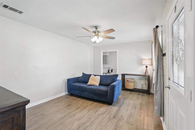 205 Davis Rd, Combine, TX 75159 - sitting room with light wood-type flooring, baseboards, and a ceiling fan