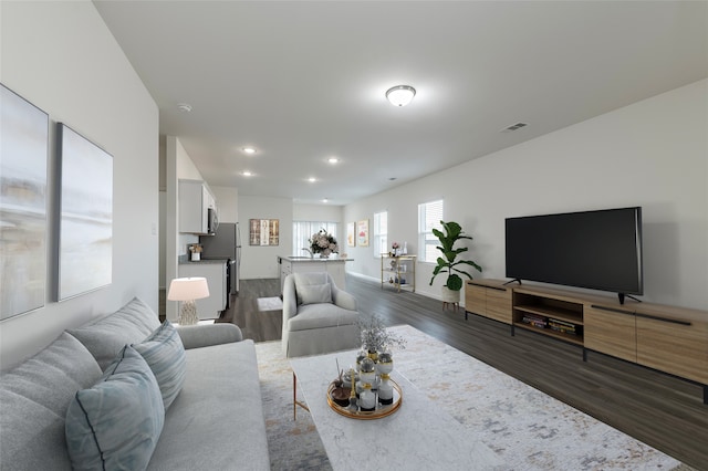 6303 Tropicana Ln, Forney, TX 75126 - living room with dark wood-type flooring, recessed lighting, and baseboards