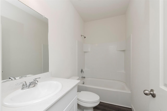 6303 Tropicana Ln, Forney, TX 75126 - full bathroom featuring toilet, shower / washtub combination, vanity, and wood finished floors