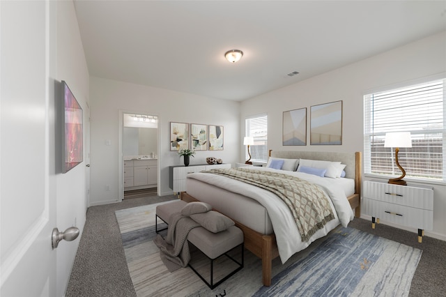 6303 Tropicana Ln, Forney, TX 75126 - bedroom with carpet floors, baseboards, and ensuite bathroom