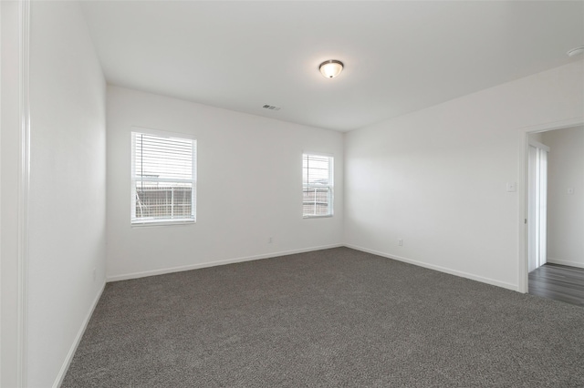 6303 Tropicana Ln, Forney, TX 75126 - unfurnished room featuring dark carpet and baseboards