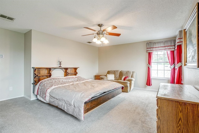10053 Pronghorn Ln, Fort Worth, TX 76108 - bedroom with carpet floors, baseboards, ceiling fan, and a textured ceiling