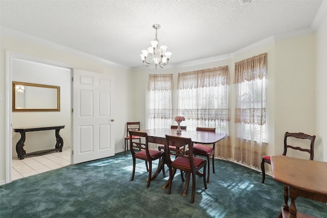 221 Valley Ranch Rd, Weatherford, TX 76087 - dining area with a chandelier, ornamental molding, carpet flooring, a textured ceiling, and tile patterned flooring