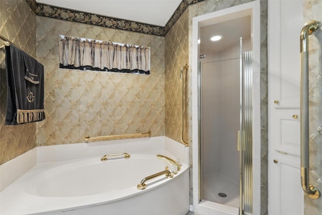 221 Valley Ranch Rd, Weatherford, TX 76087 - bathroom with a garden tub, a stall shower, and tile walls