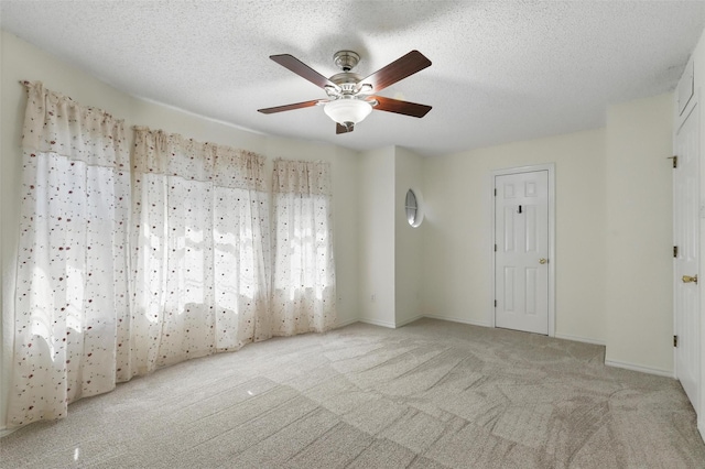 221 Valley Ranch Rd, Weatherford, TX 76087 - unfurnished room with a ceiling fan, carpet floors, and a textured ceiling