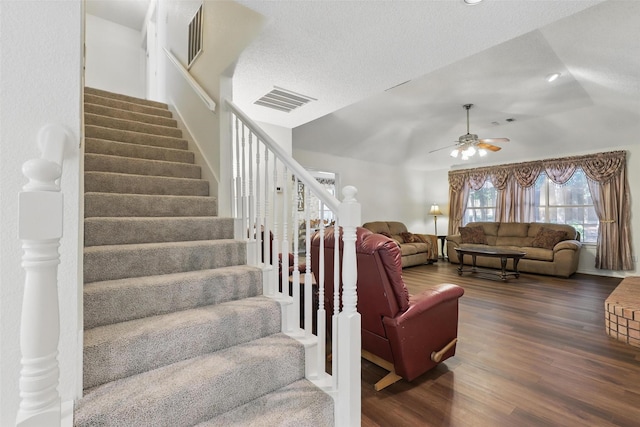 221 Valley Ranch Rd, Weatherford, TX 76087 - stairway with a ceiling fan, wood finished floors, lofted ceiling, a textured ceiling, and recessed lighting