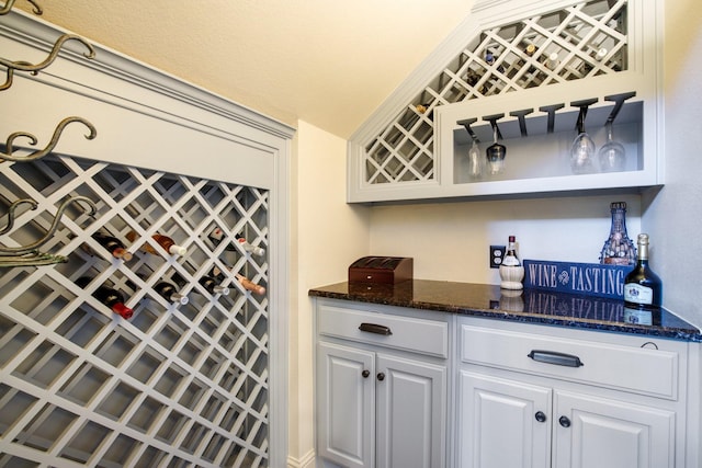 wine cellar featuring a bar