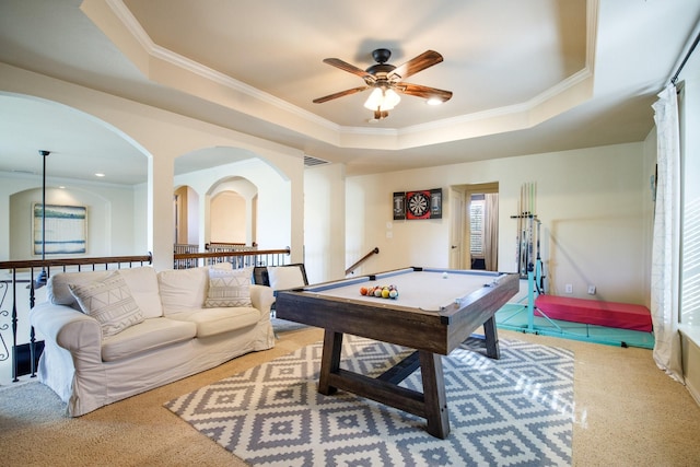 recreation room with a ceiling fan, crown molding, a tray ceiling, and pool table