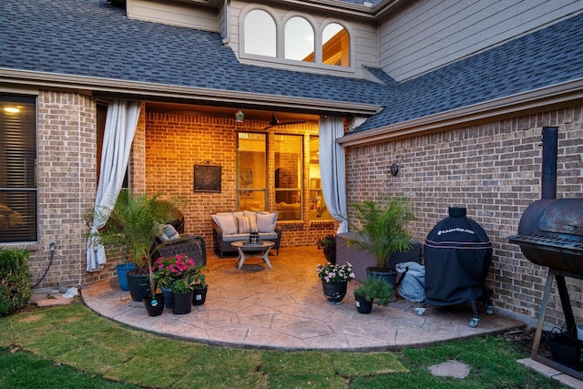 view of patio featuring an outdoor hangout area and a grill