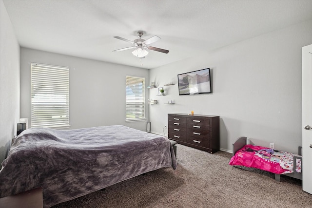 1127 Donnington Trl, Saginaw, TX 76131 - carpeted bedroom with baseboards and a ceiling fan