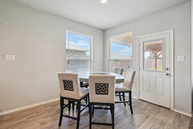 1127 Donnington Trl, Saginaw, TX 76131 - dining room featuring baseboards, light wood finished floors, and recessed lighting