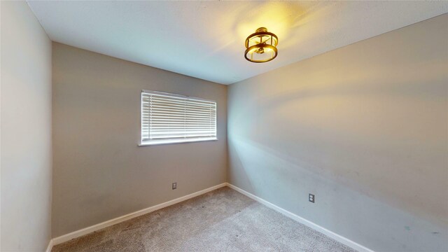 2810 Dove Meadow Dr, Garland, TX 75043 - empty room featuring light colored carpet and baseboards