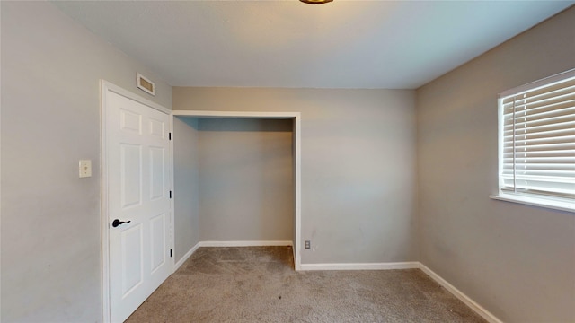 2810 Dove Meadow Dr, Garland, TX 75043 - unfurnished bedroom featuring carpet, baseboards, and a closet