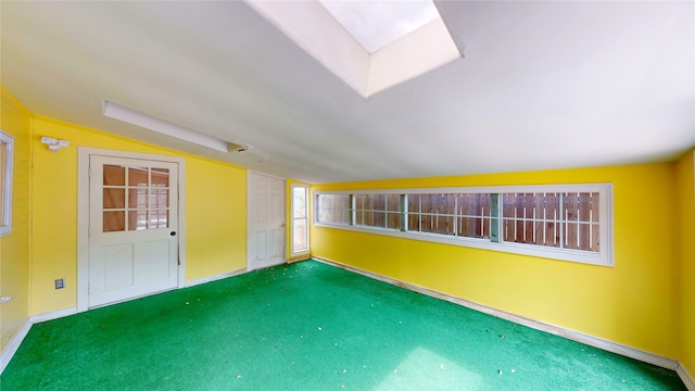 2810 Dove Meadow Dr, Garland, TX 75043 - carpeted empty room featuring lofted ceiling and baseboards