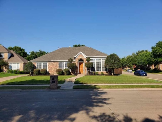traditional home with a front lawn