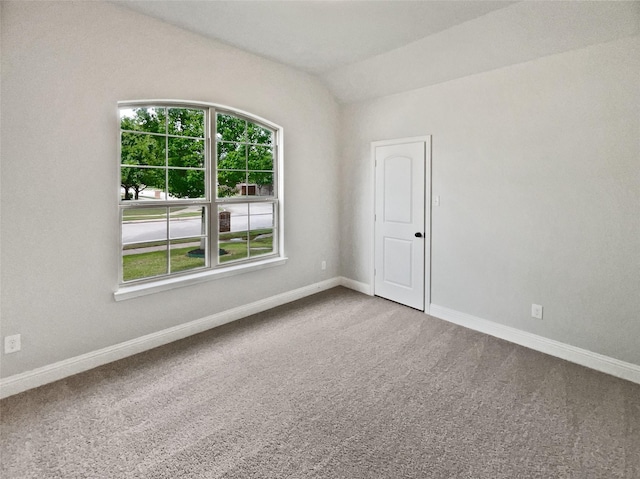 312 Canadian Ln, Burleson, TX 76028 - carpeted spare room featuring baseboards and lofted ceiling