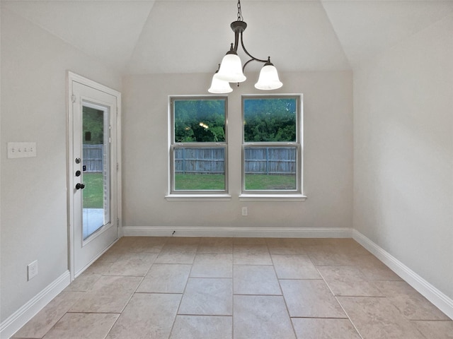 312 Canadian Ln, Burleson, TX 76028 - unfurnished dining area with lofted ceiling and baseboards