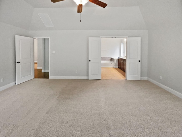 312 Canadian Ln, Burleson, TX 76028 - unfurnished bedroom with light colored carpet, vaulted ceiling, baseboards, ensuite bathroom, and a ceiling fan
