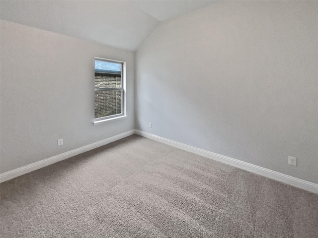 312 Canadian Ln, Burleson, TX 76028 - carpeted empty room featuring lofted ceiling and baseboards