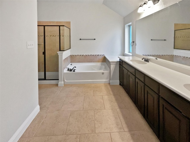 312 Canadian Ln, Burleson, TX 76028 - bathroom with tile patterned flooring, vaulted ceiling, a garden tub, a shower stall, and double vanity