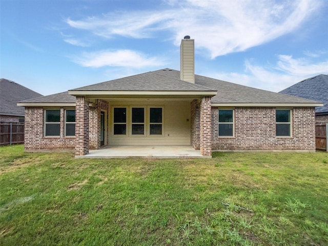 312 Canadian Ln, Burleson, TX 76028 - rear view of house featuring brick siding, a patio area, a chimney, and roof with shingles