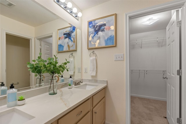 9716 Meadow Creek Dr, Denton, TX 76226 - bathroom featuring a spacious closet and double vanity