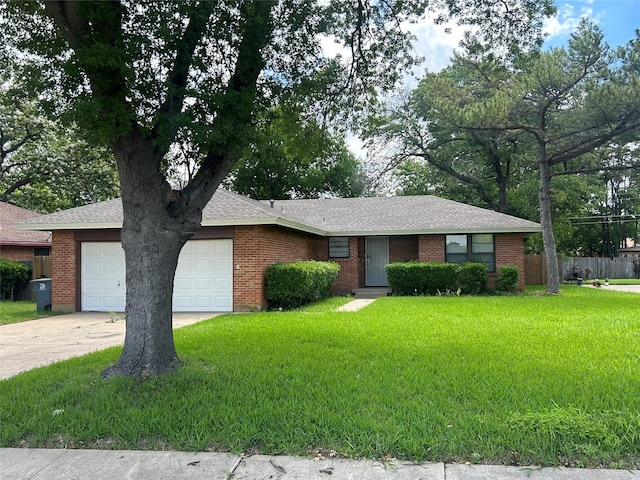 5004 Haywood Pkwy, Dallas, TX 75232 - single story home with an attached garage, driveway, and a shingled roof