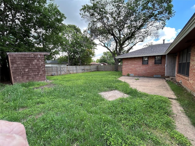 5004 Haywood Pkwy, Dallas, TX 75232 - view of yard with a patio area and an outbuilding