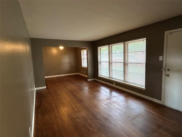5004 Haywood Pkwy, Dallas, TX 75232 - unfurnished room featuring wood finished floors and baseboards