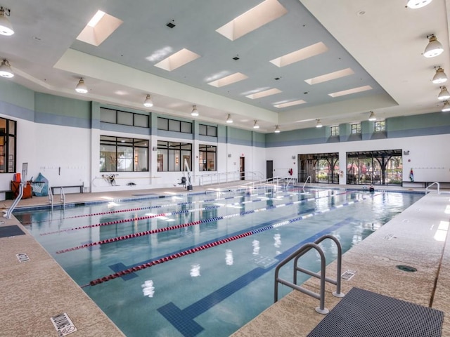 11708 Southerland Dr, Denton, TX 76207 - indoor pool featuring a skylight