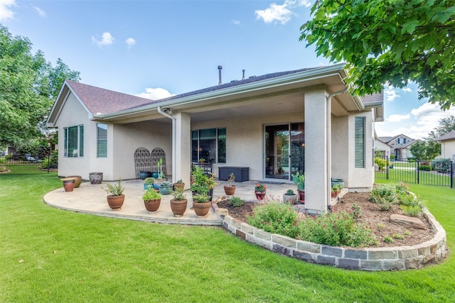 11708 Southerland Dr, Denton, TX 76207 - rear view of house with a patio and stucco siding