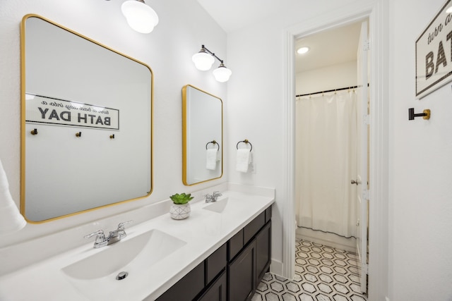 1908 St Andrews Dr, Celina, TX 75009 - full bathroom featuring double vanity and a shower with shower curtain