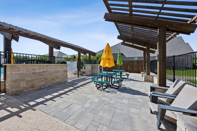 1908 St Andrews Dr, Celina, TX 75009 - view of patio / terrace with fence, a pergola, and outdoor dining space