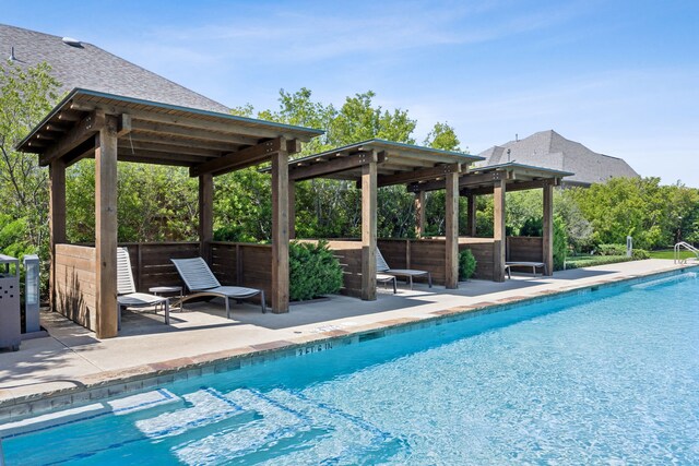 1908 St Andrews Dr, Celina, TX 75009 - swimming pool featuring a patio
