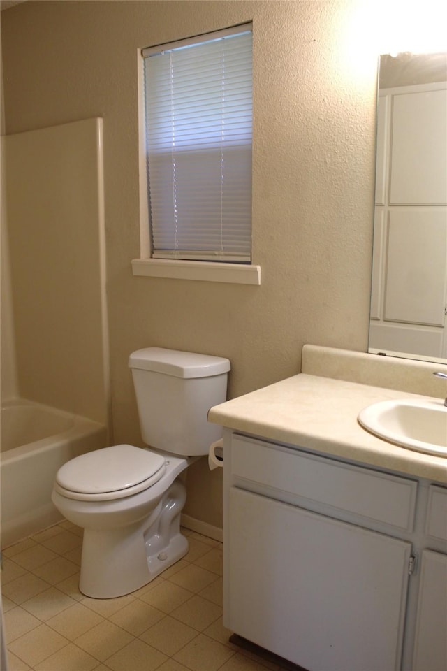 534 N Race St, Stephenville, TX 76401 - full bath with tile patterned flooring, toilet, vanity, a bath, and a shower