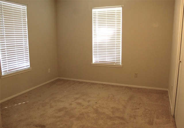 534 N Race St, Stephenville, TX 76401 - carpeted spare room featuring baseboards