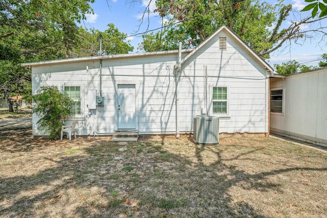 534 N Race St, Stephenville, TX 76401 - rear view of property with central AC and entry steps