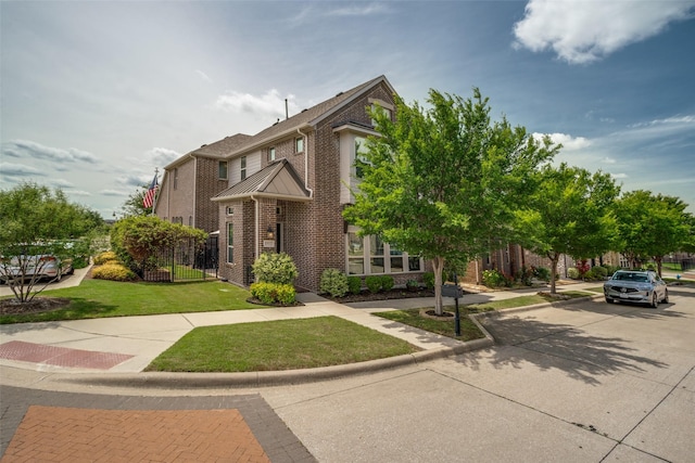 5912 Uplands Dr, Mckinney, TX 75070 - view of front of property with brick siding and a standing seam roof