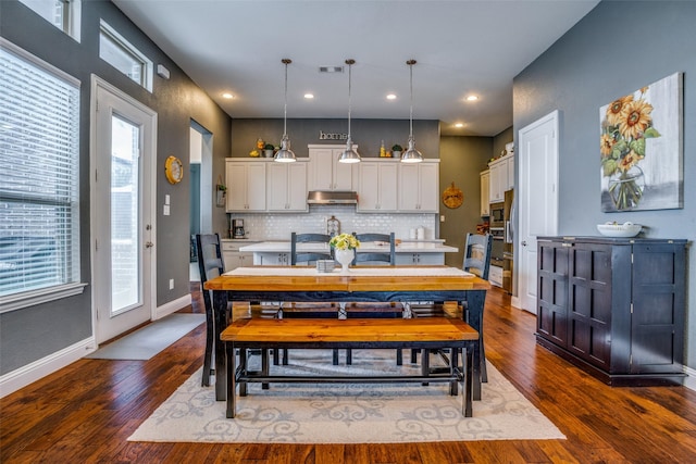 5912 Uplands Dr, Mckinney, TX 75070 - dining room with dark wood-style flooring, baseboards, and recessed lighting