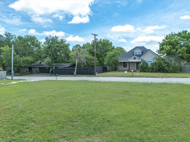 206 Taylor St, Bowie, TX 76230 - view of yard with concrete driveway