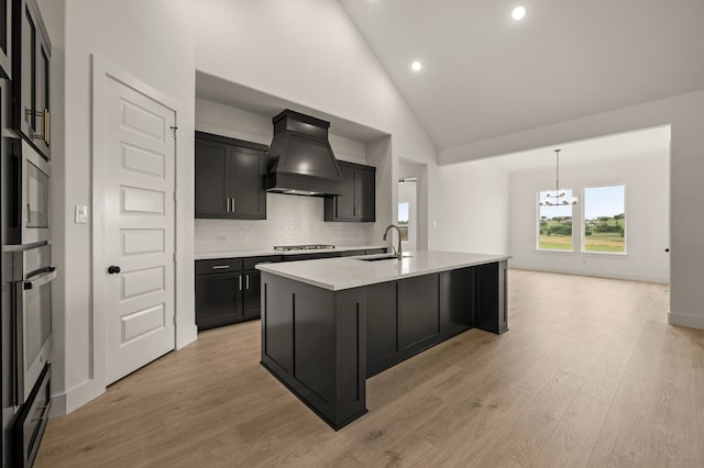 4413 Sandstrom Way, Fort Worth, TX 76179 - kitchen with custom range hood, a sink, a chandelier, light countertops, and high vaulted ceiling